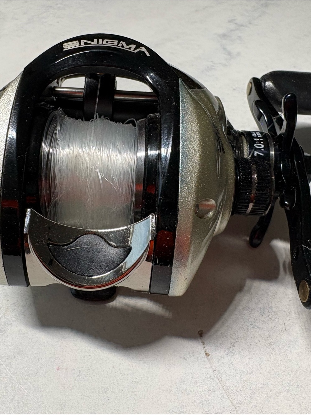 Bass Pro Shops Enigma Smart Cast Reel - Black and Gold - Picture 2 of 10